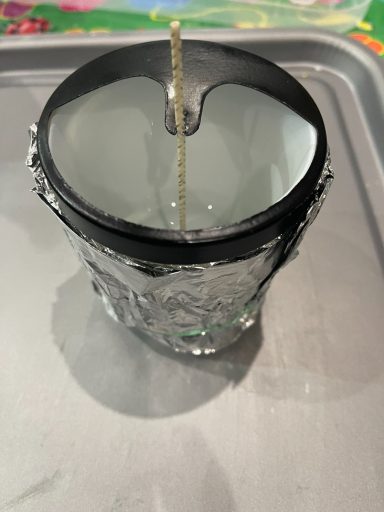 Candle ready for wax to be poured into